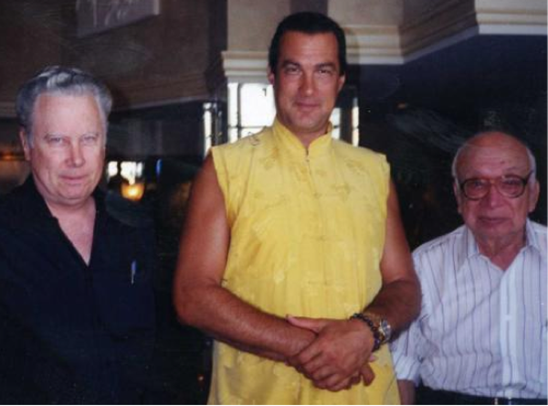 A photo of John Alexander, Steven Segal, and Phil Corso.